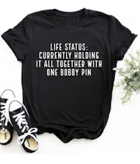 life status currently holding it together with one bobby pin tee