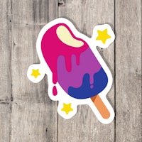 an ice cream pop sticker with stars on it