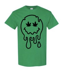 a green t - shirt with a smiley face on it