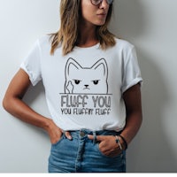a woman wearing glasses and a t - shirt that says fluff you