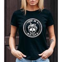 a woman wearing a black t - shirt with a skull on it