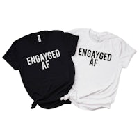 two t - shirts that say engaged af