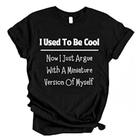 a black t - shirt that says i used to be cool now i just rage with a miniature version of myself