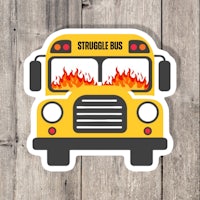 a school bus sticker with the words struggle bus on it